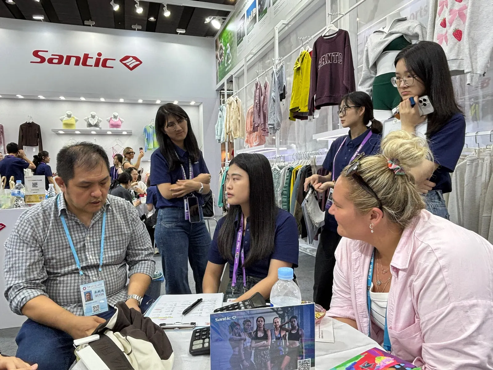 Founders meeting a supplier at an apparel booth during the Canton Fair in Guangzhou