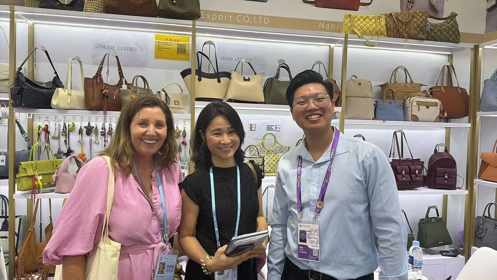 Reviewing products and supplier quotes at a sourcing trade fair stand